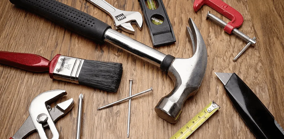 Handyman tools laid out for home repair and maintenance work in Rochester, NY
